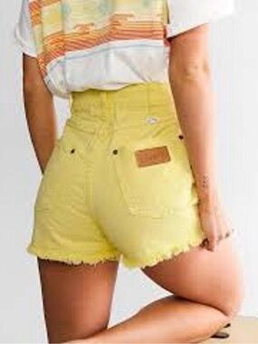 Wrangler High-Waist Yellow Denim Shorts with Frayed Hem